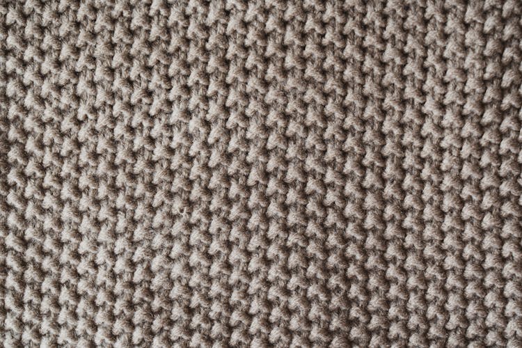 Brown And White Knit Textile