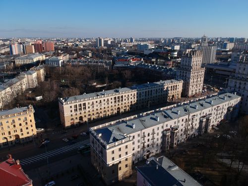 Free Aerial cityscape of Minsk, showcasing historic architecture and urban skyline in winter. Stock Photo