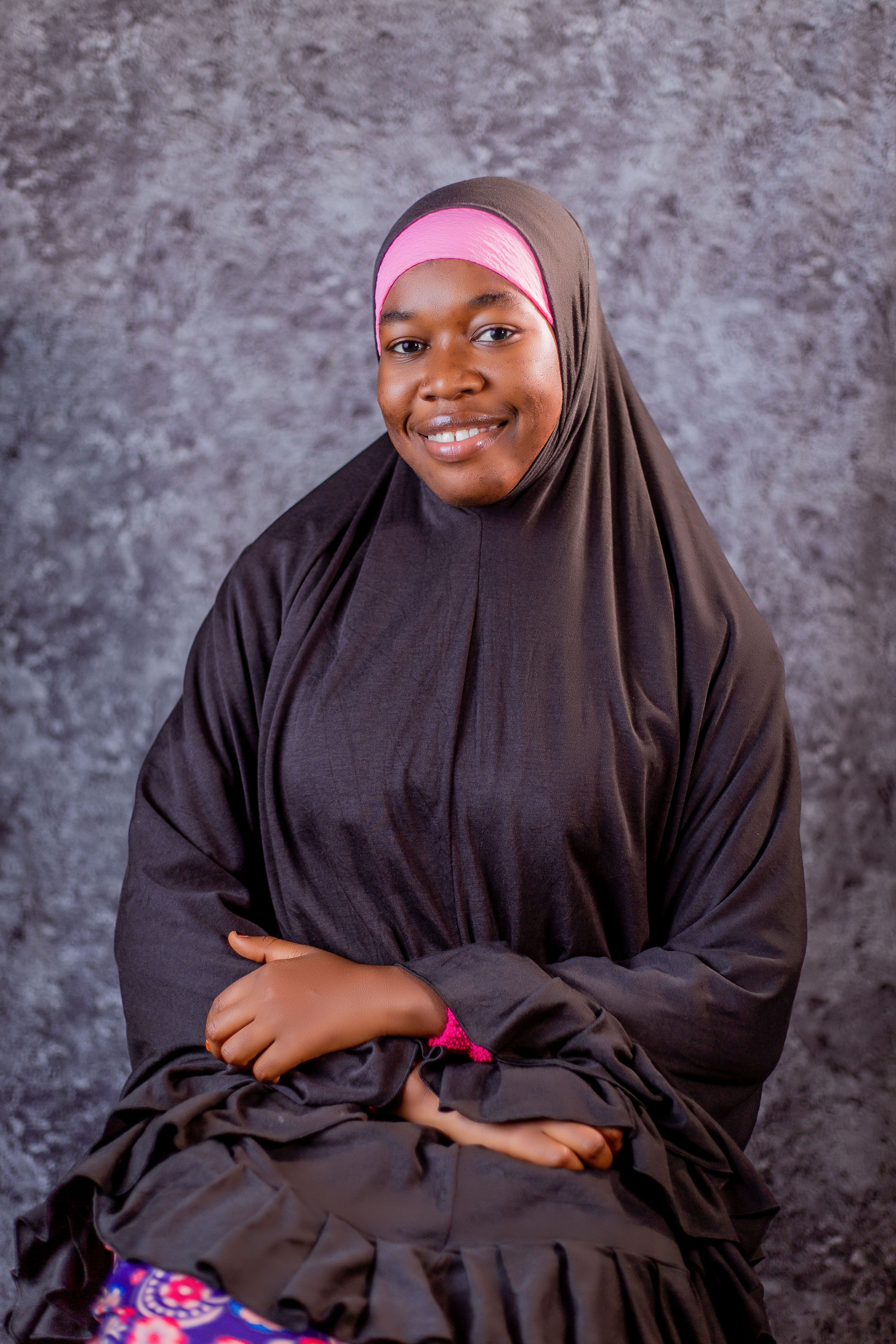 Portrait of a Smiling Woman in Hijab · Free Stock Photo