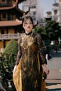 Elegant Woman in Traditional Dress at Asian Landmark