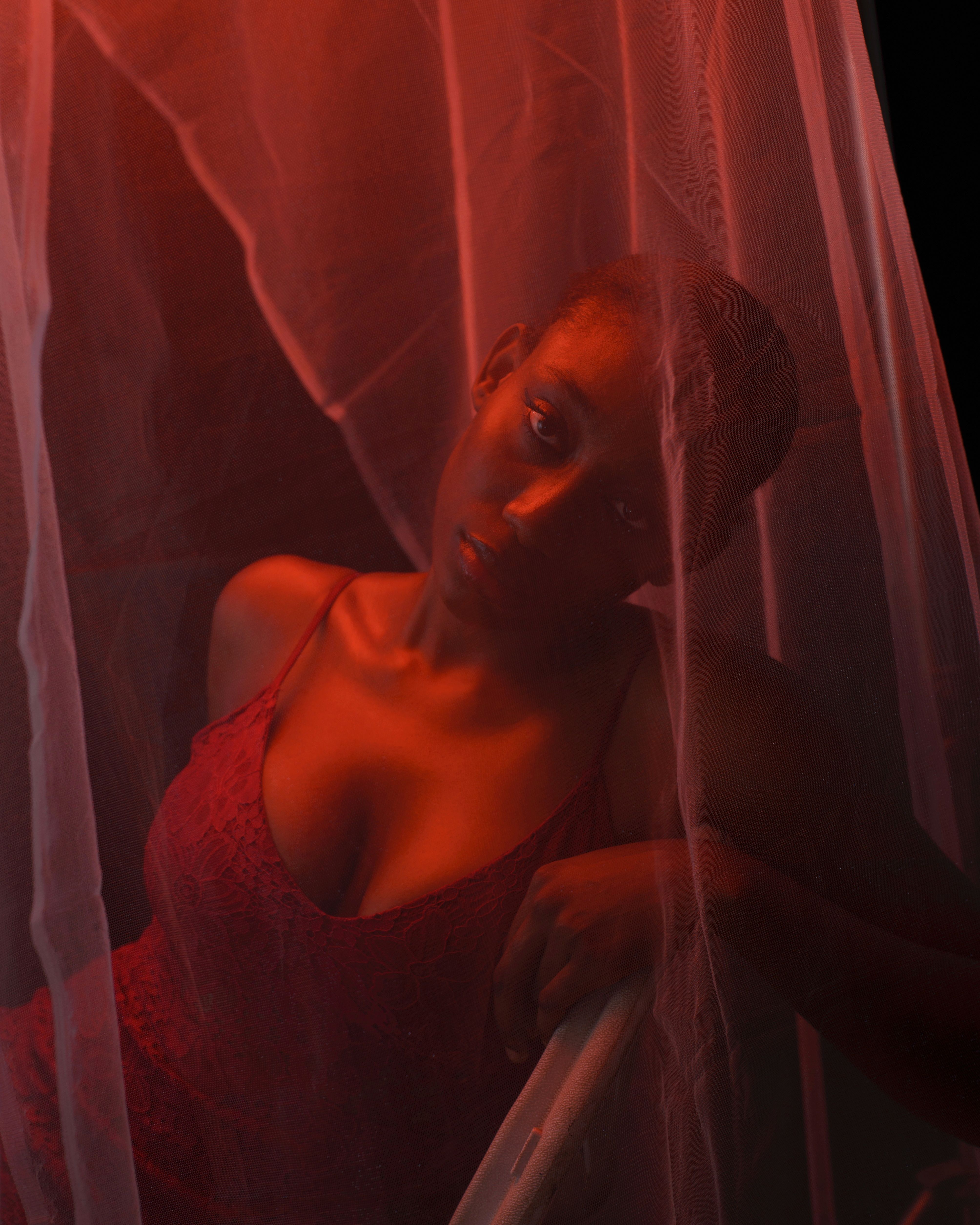Dramatic Portrait of Woman in Red Lighting · Free Stock Photo