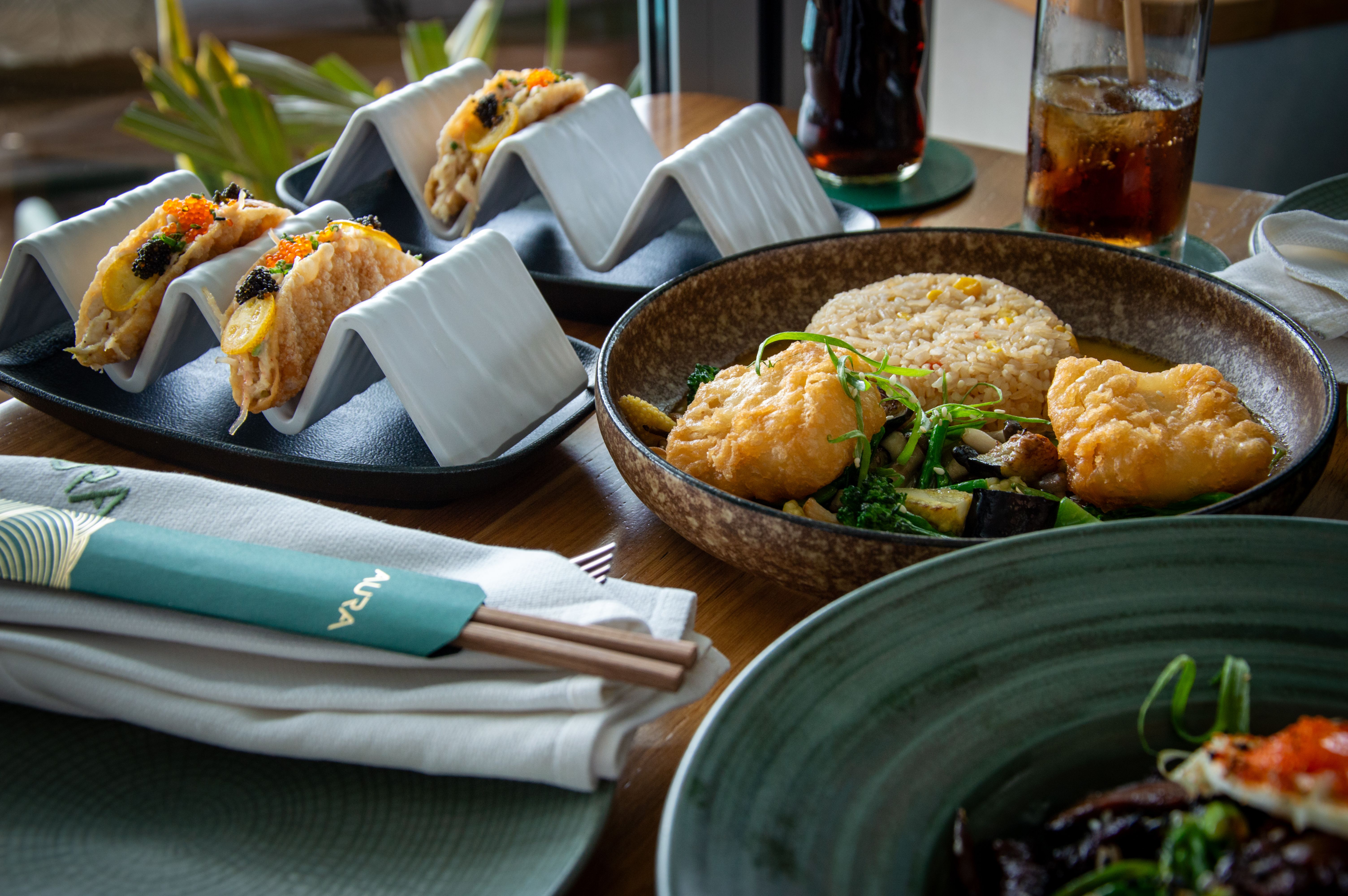Delicious Asian Fusion Cuisine in Modern Setting · Free Stock Photo