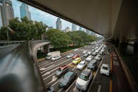 Busy Urban Traffic in Modern Cityscape