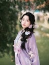 Young Woman in Traditional Hanfu Dress Outdoors