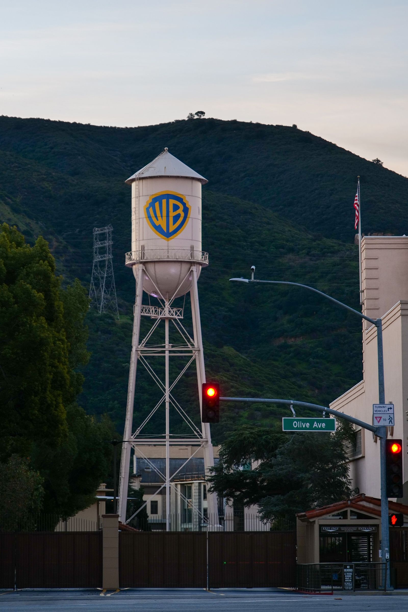 Warner Bros. water tower on the studio lot in Burbank, California at sunset, illustrative photo for the shake-up of Warner Bros.' film leadership