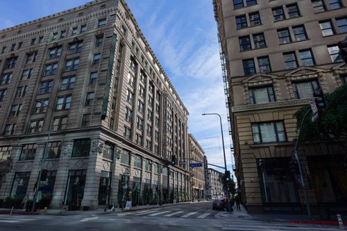 Free Captivating street view of classic architecture in downtown Los Angeles under a clear blue sky. Stock Photo