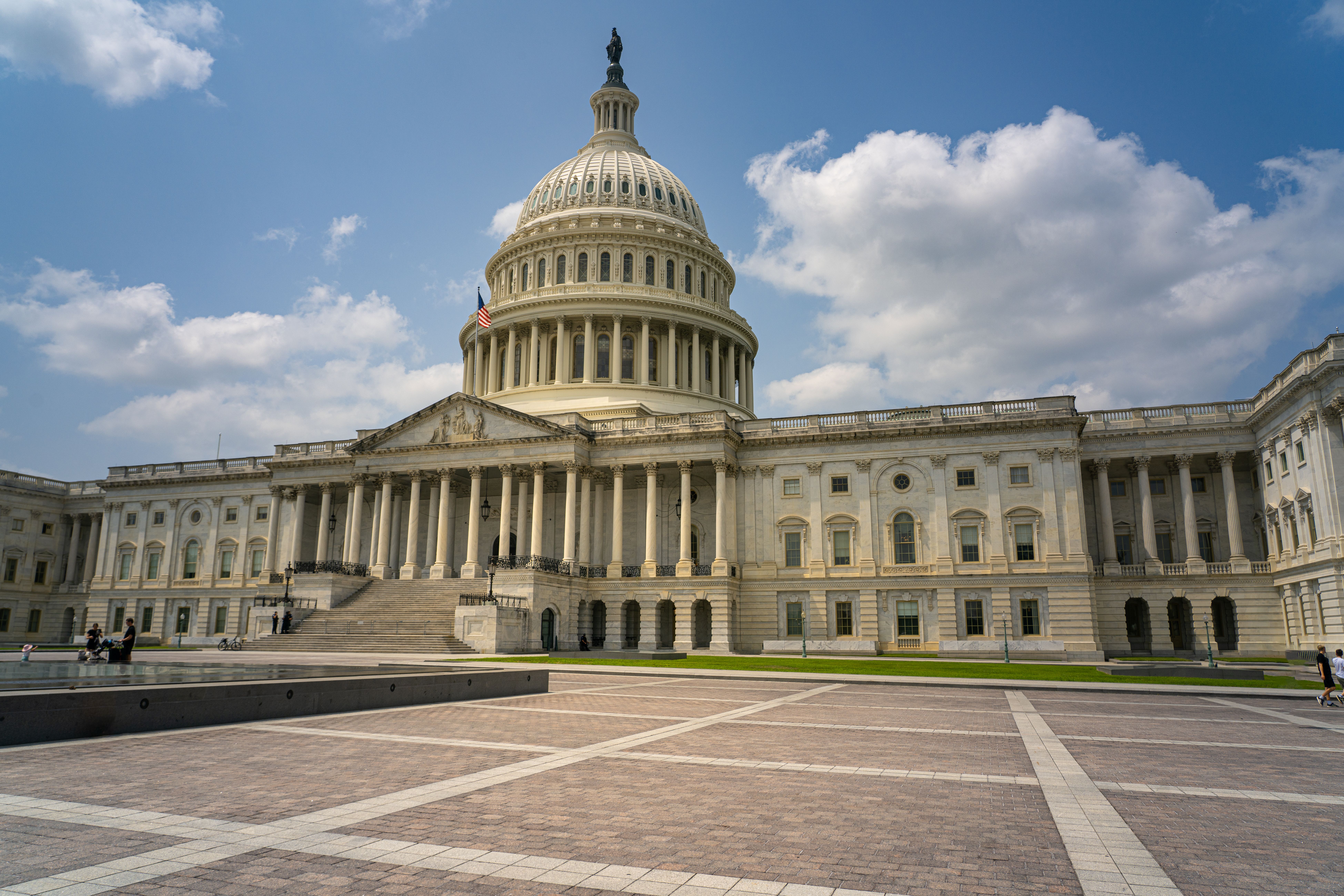 Free Beautiful daytime view of the historic United States Capitol in Washington D.C. showcasing its majestic architecture. Stock Photo