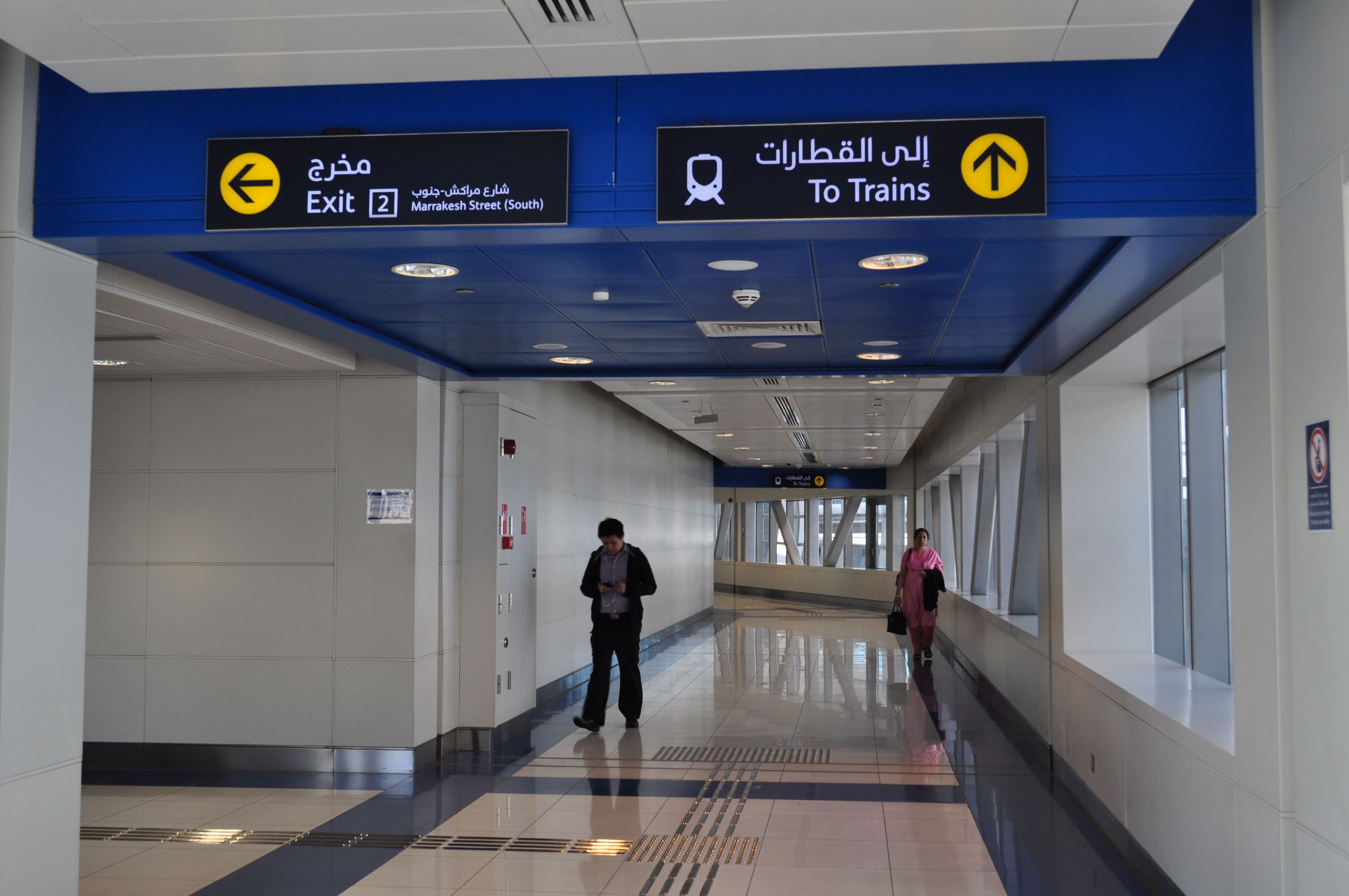 Dubai Metro train arriving at an airport station in UAE