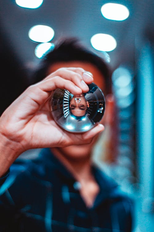 Person Holding Lensball