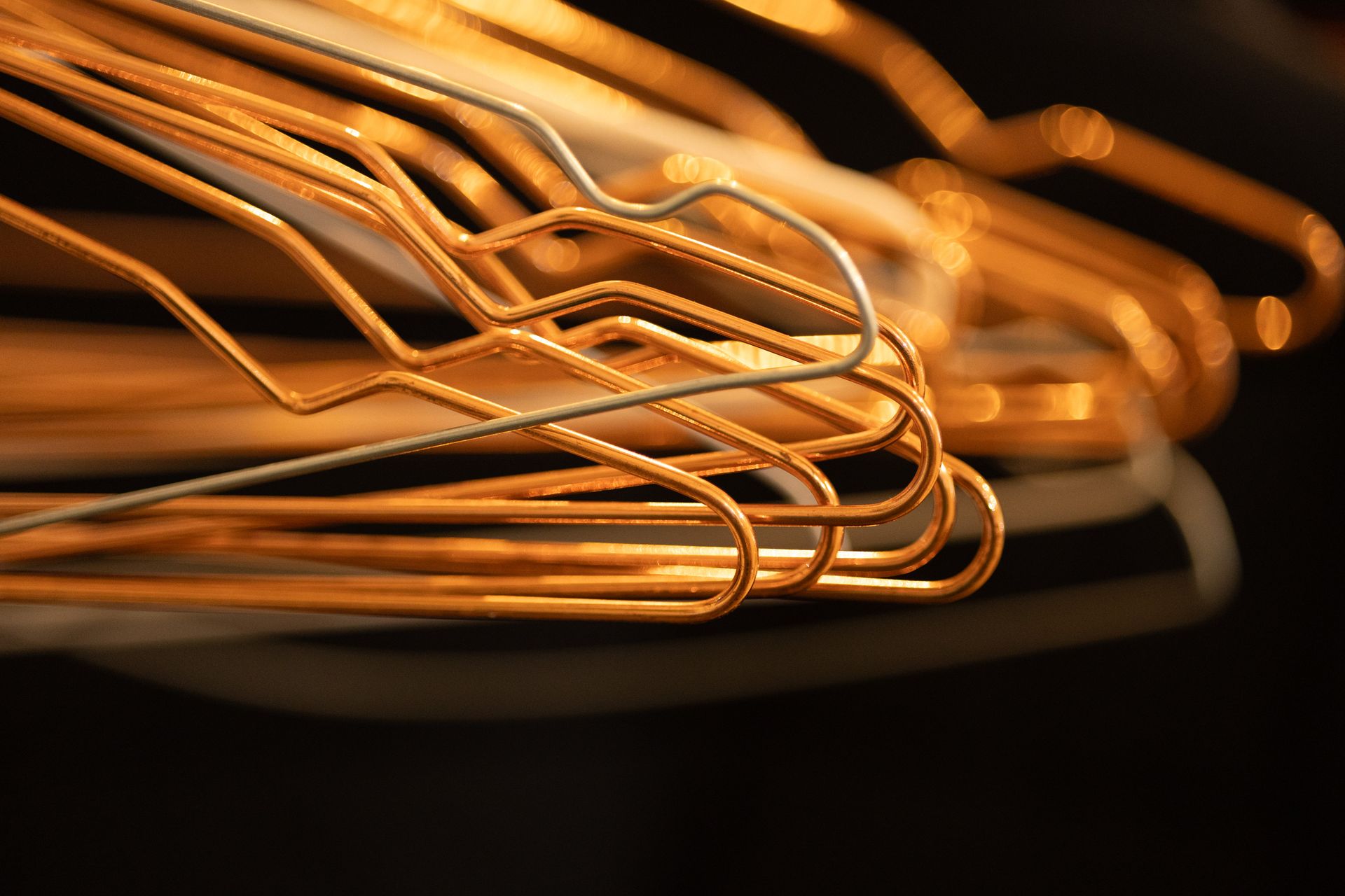 Abstract composition of overlapping wire clothes hangers