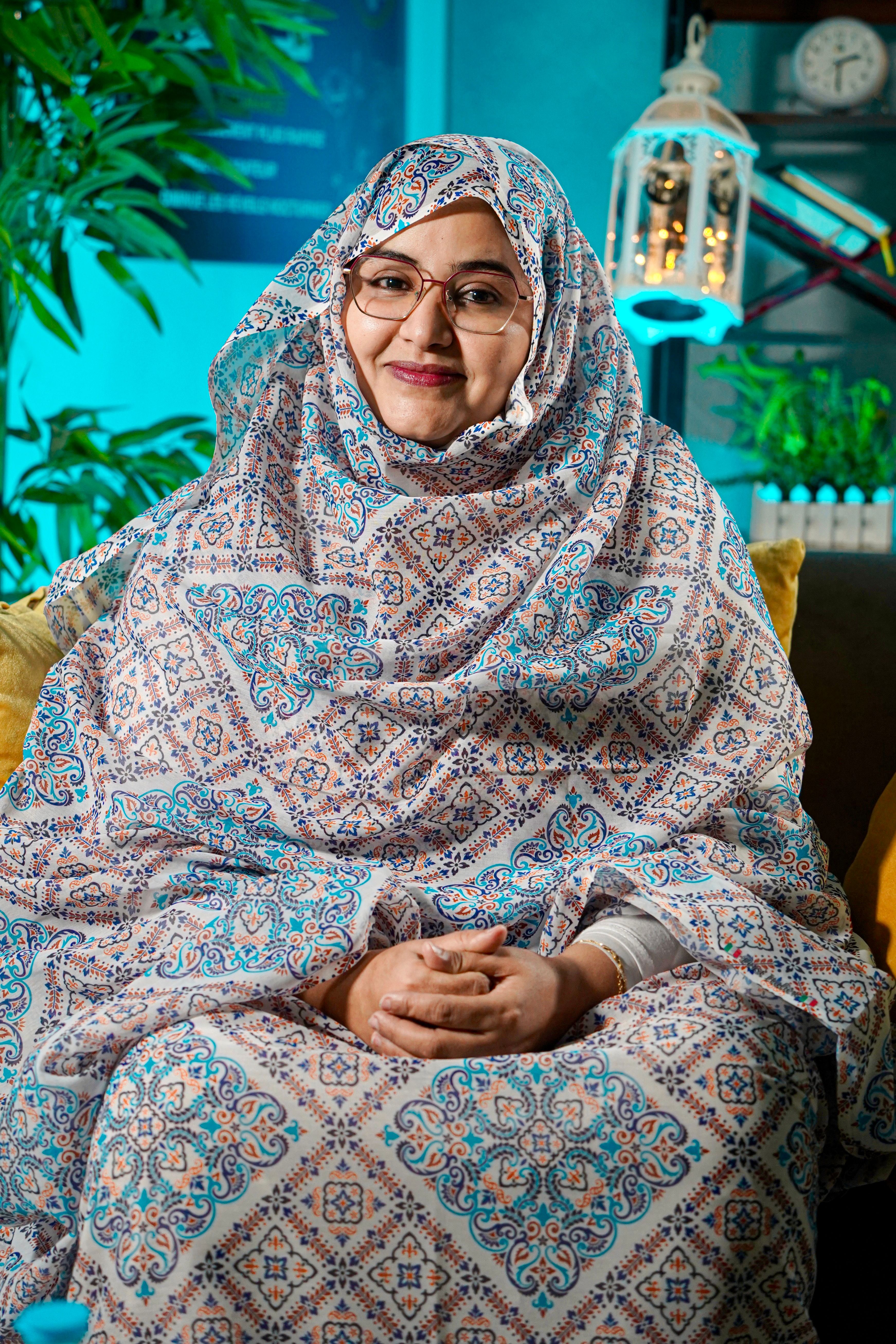 Portrait of Smiling Woman in Traditional Attire