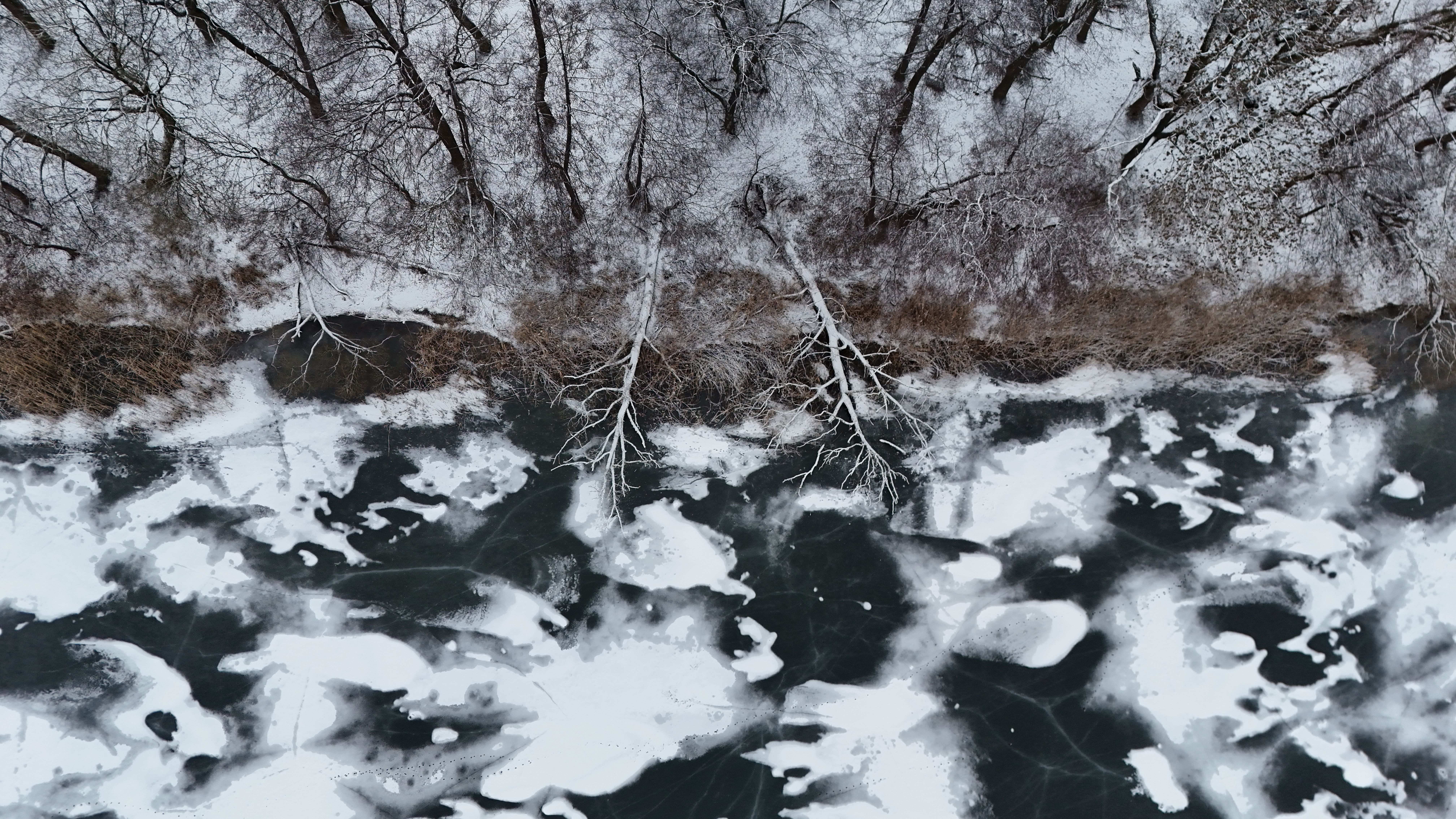 Aerial View of Frozen River in Winter Landscape · Free Stock Photo