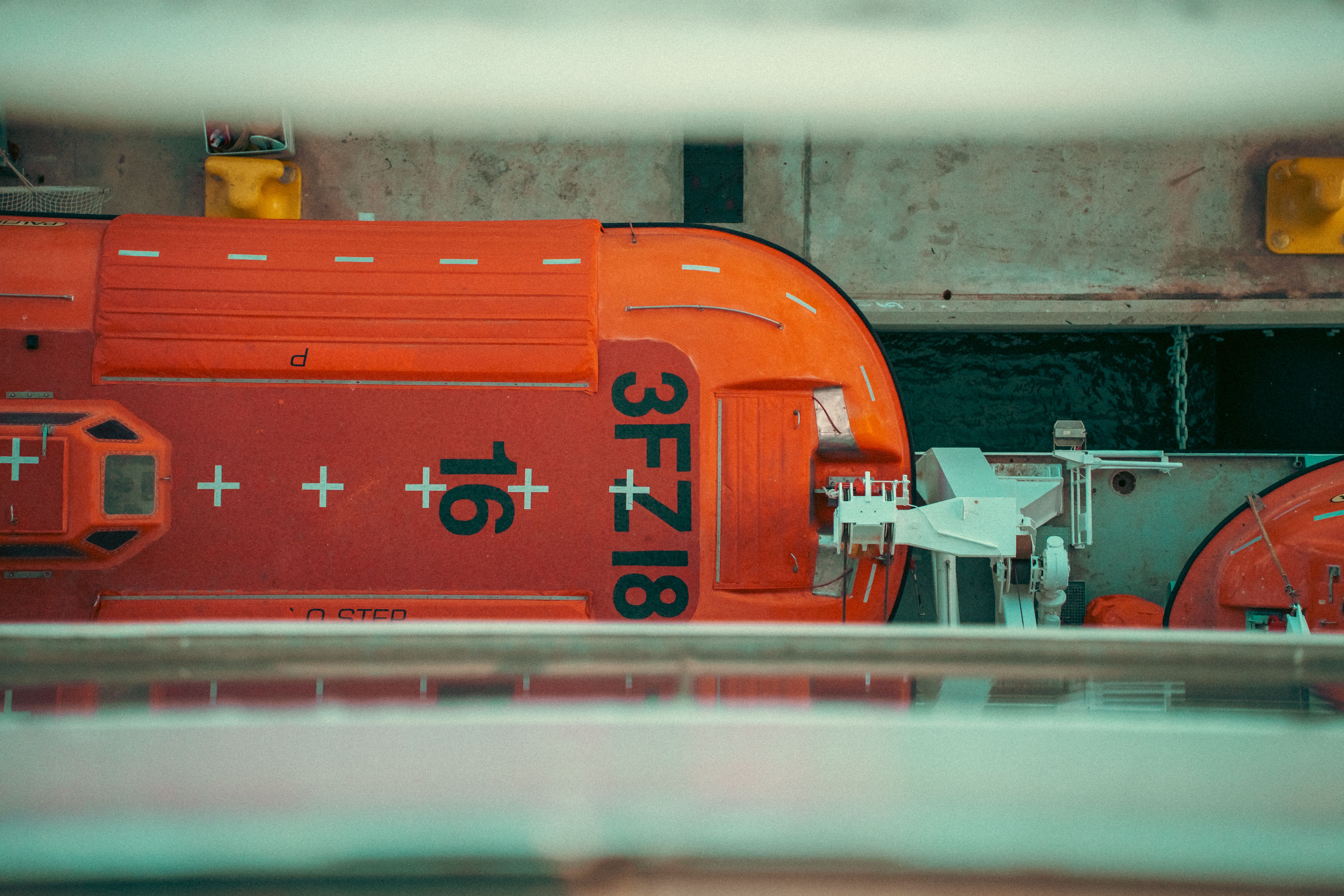 Aerial View of Orange Lifeboats on a Ship Docked in Spain · Free Stock ...