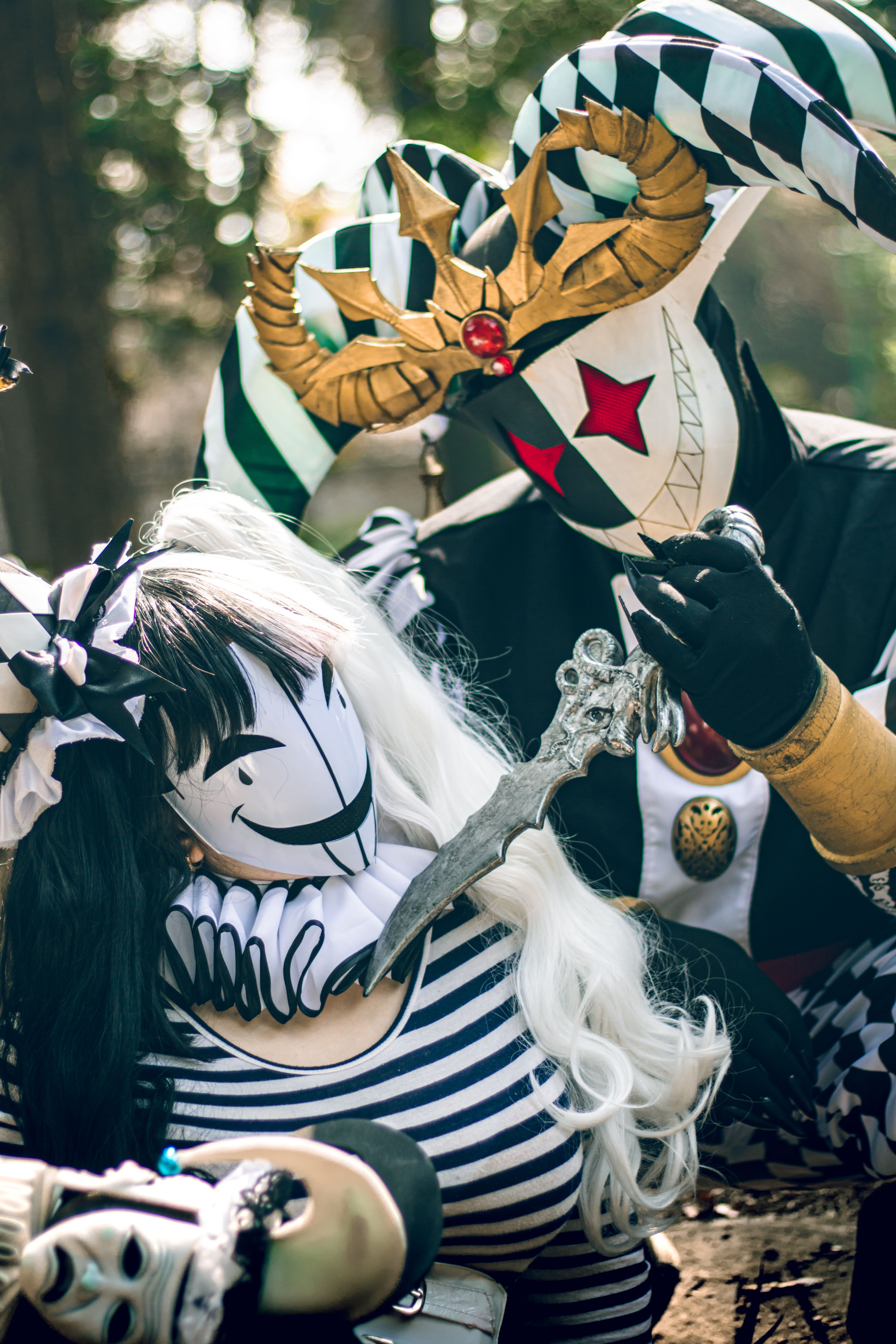 Intricate Jester Cosplay in Park Setting
