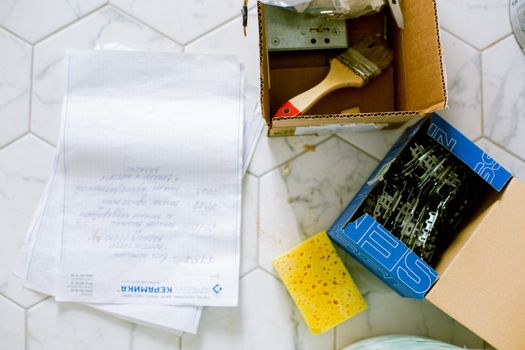 Papers, Sponge and Boxes on the Floor