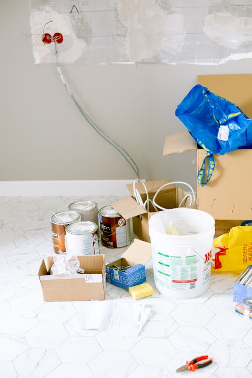 Blue Plastic on Brown Cardboard Box