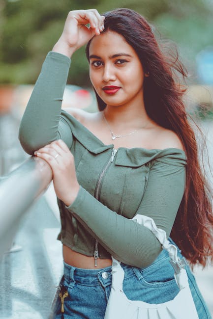 Stylish portrait of a young woman with long hair in Bengaluru, India.