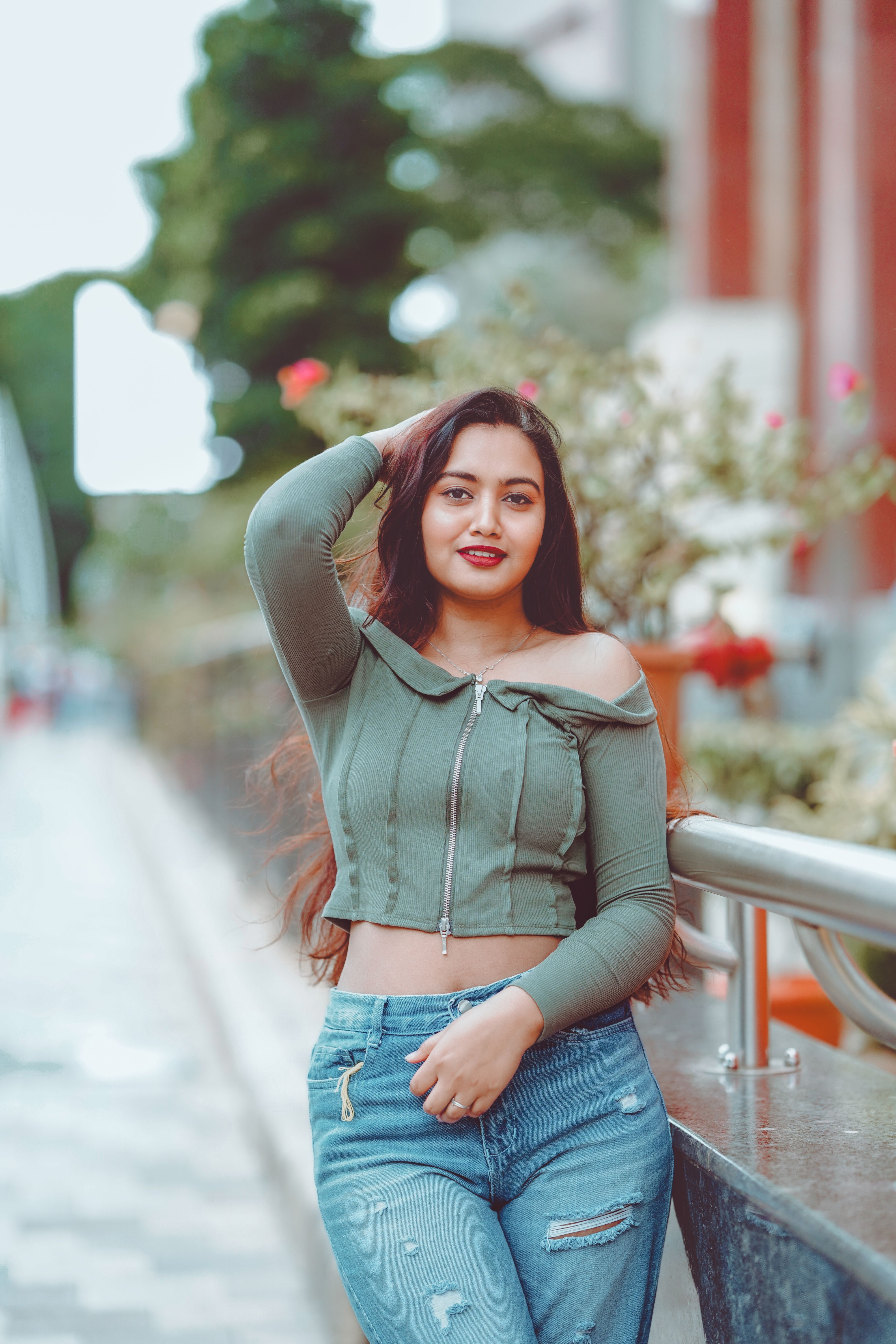 Portrait of a Young Woman Outdoors in Urban Setting · Free Stock Photo
