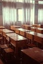 Empty Classroom with Wooden Desks in Soft Light