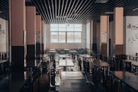 Empty Cafeteria Interior with Wooden Tables