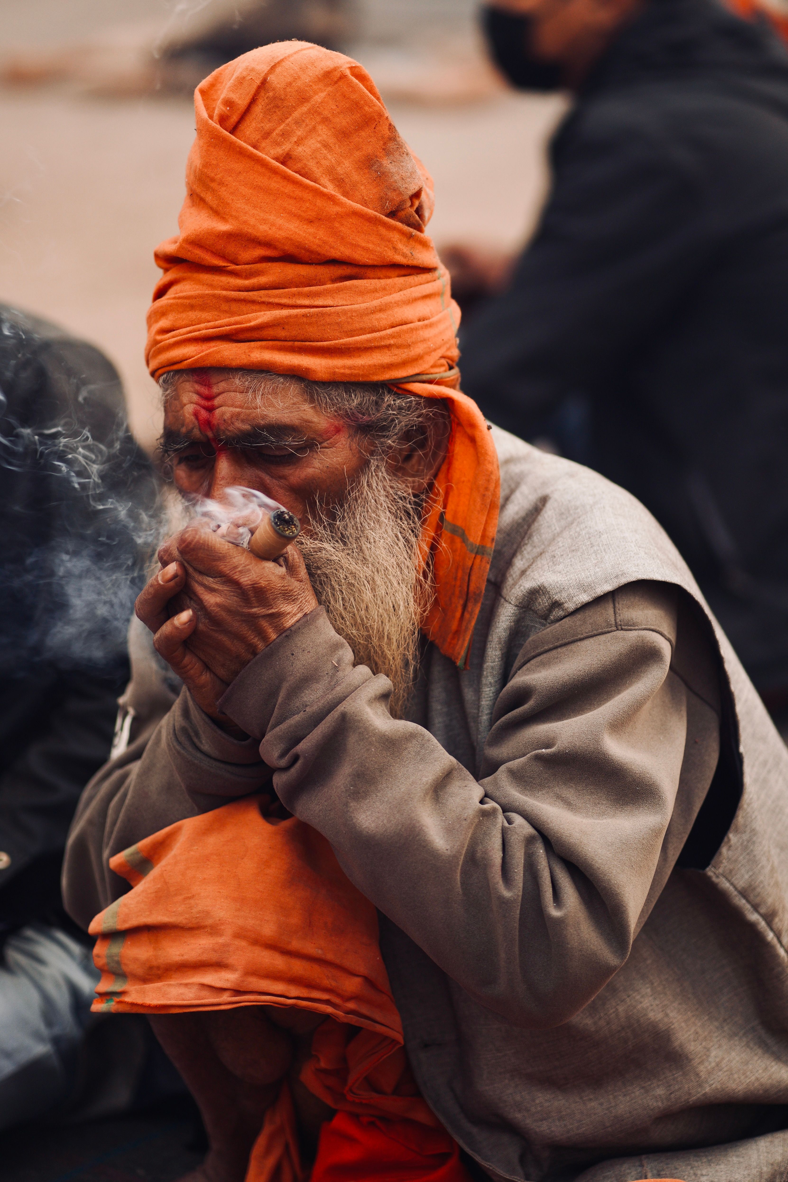 Portrait of a Hindu Sadhu Smoking Ritual Pipe · Free Stock Photo