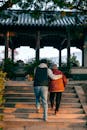 Supportive Walk in Traditional Chinese Garden