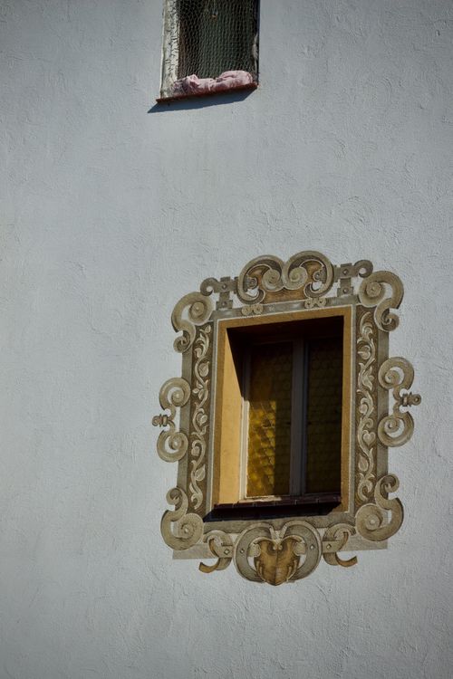 Window Frame Decorative Profile Decorative Historical Window Frame on White Wall · Free Stock Photo