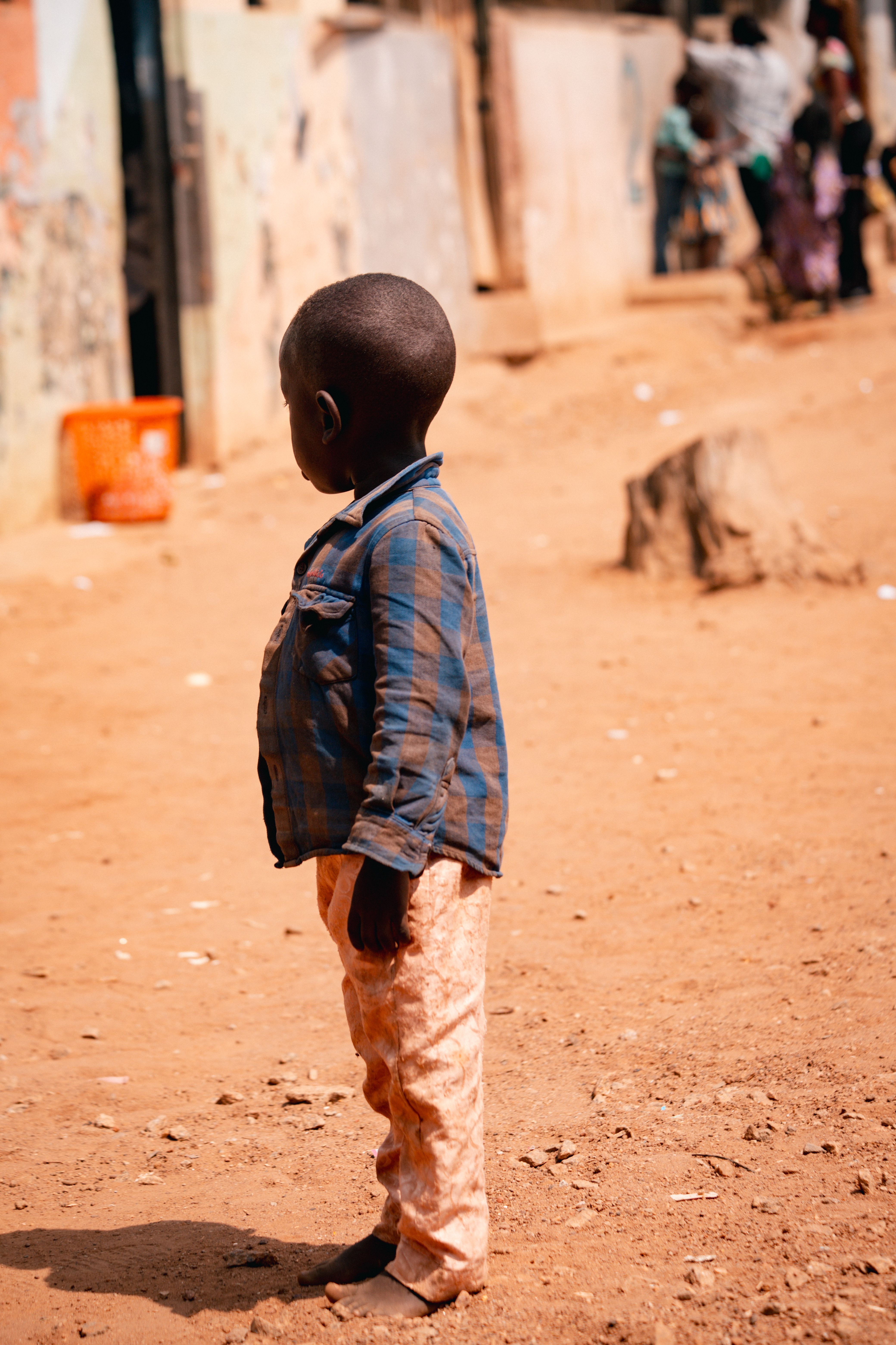 Young Child in Rural African Village Setting · Free Stock Photo