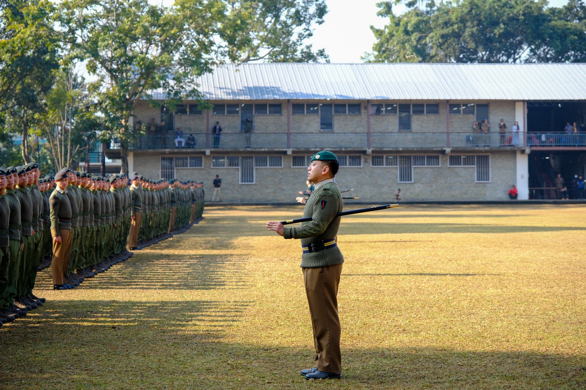 Gurkha soldiers stand in formation during a ceremonial parade in Pokhara, Nepal.