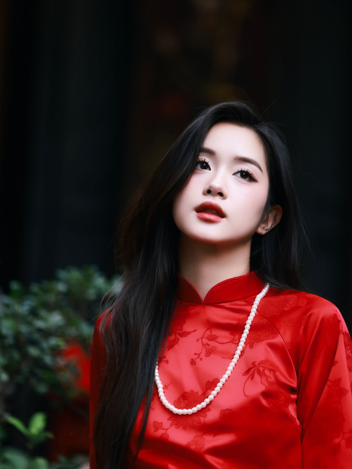 Elegant woman in red traditional dress outdoors · Free Stock Photo
