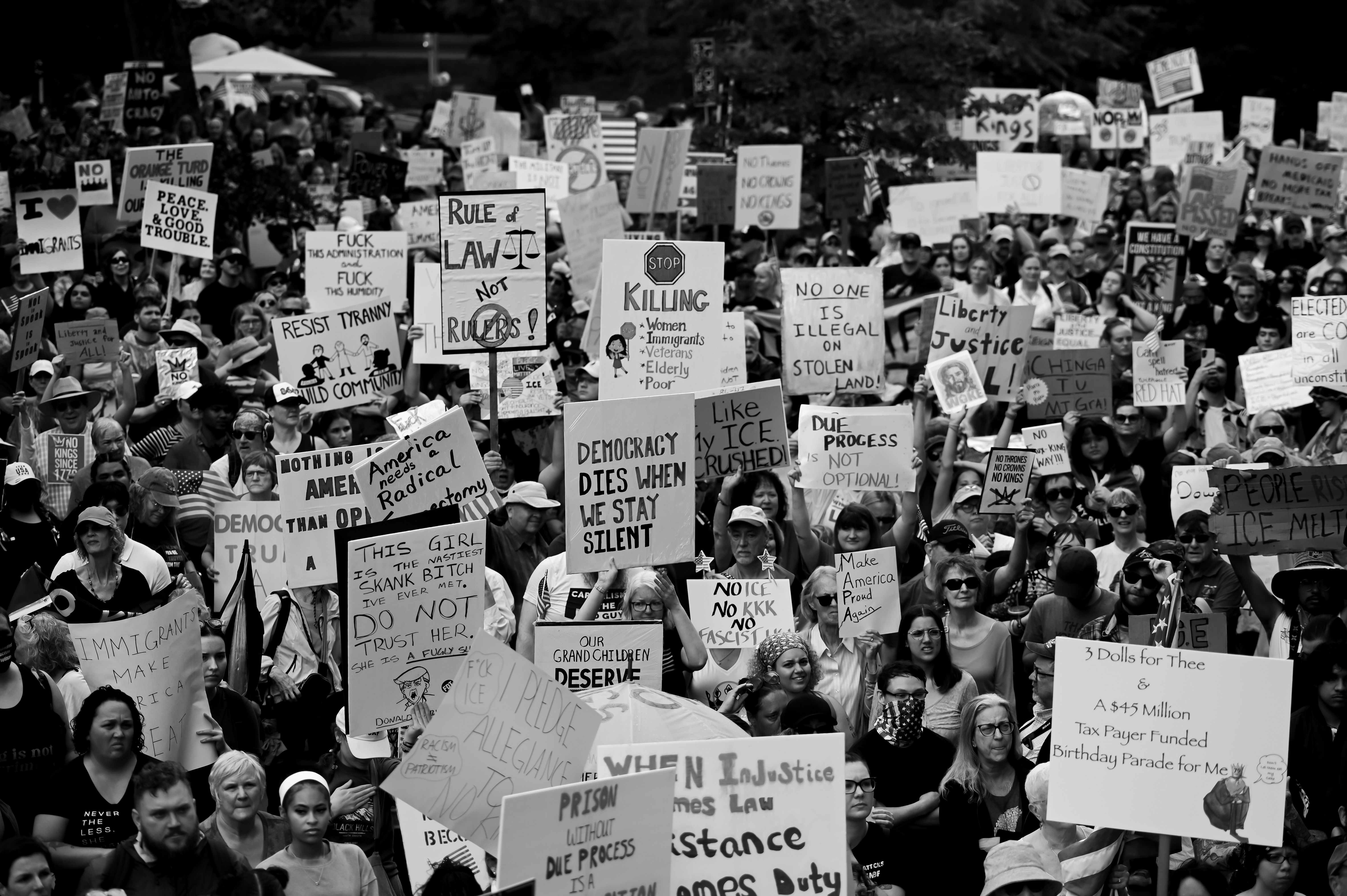 Large Political Protest with Diverse Slogans · Free Stock Photo