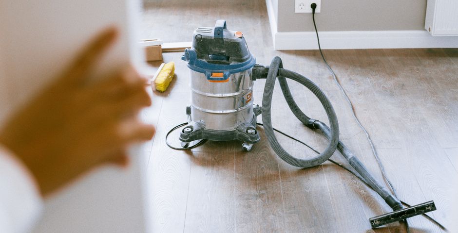 Vacuuming a unit during turnover — the changeover is the moment to run the pest checks