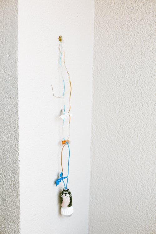 Photo of Electrical Wirings on White Wall