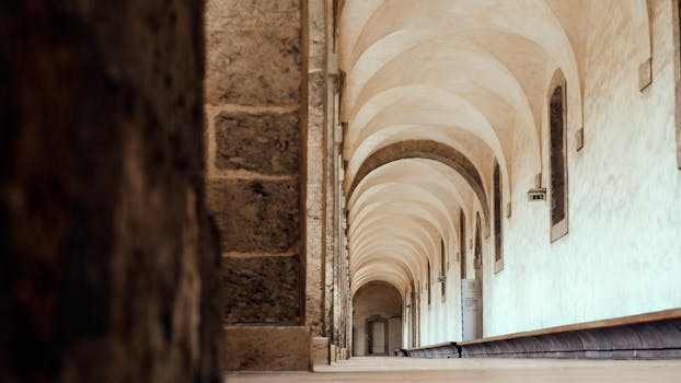 Discover the timeless beauty of this arched corridor in Marseille, showcasing classic French architecture.