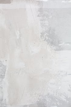 High-resolution image of an abstract textured wall with white and gray tones, perfect for backgrounds and design projects.