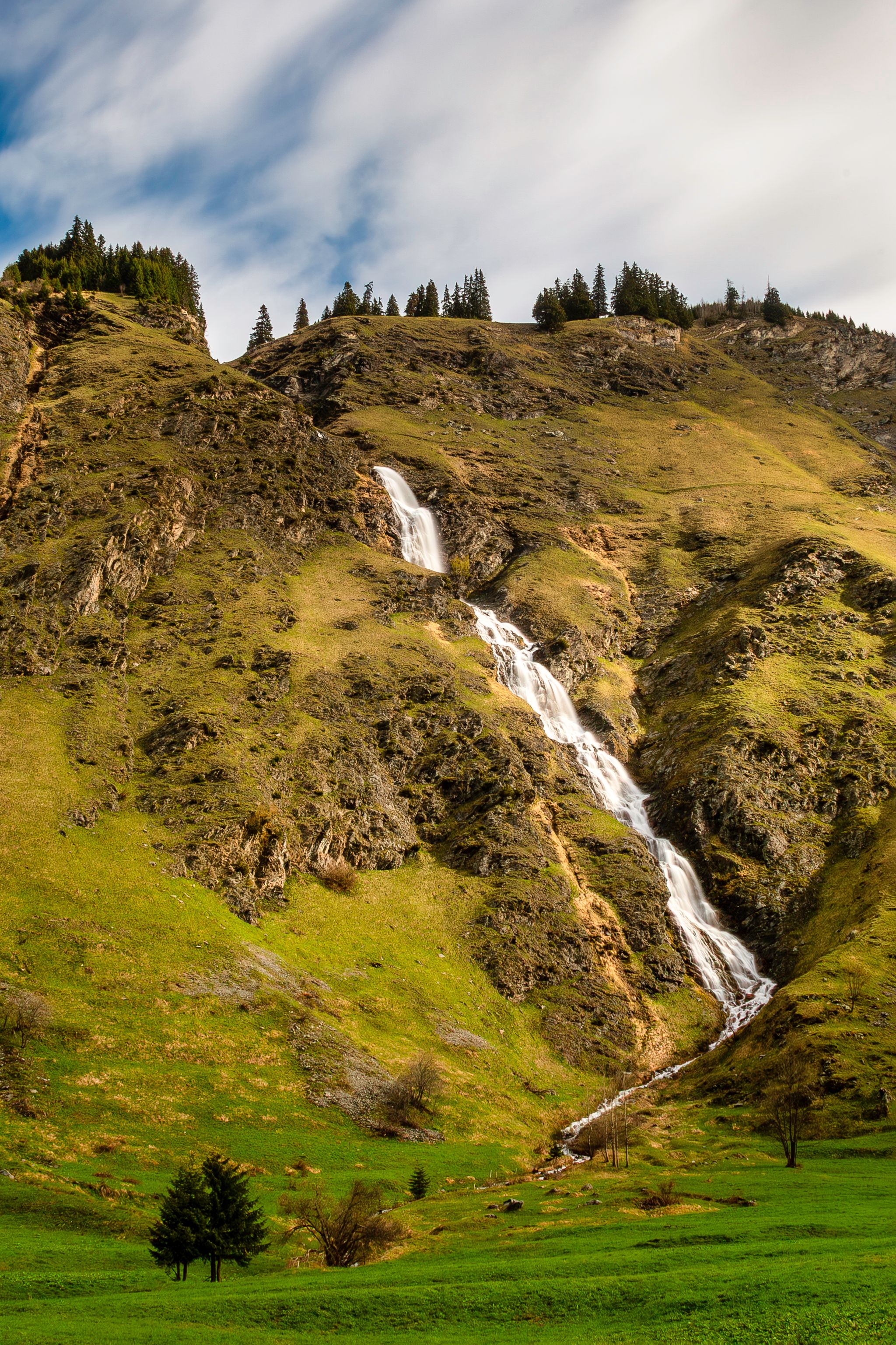 Majestic Mountain Waterfall in Spring Landscape · Free Stock Photo