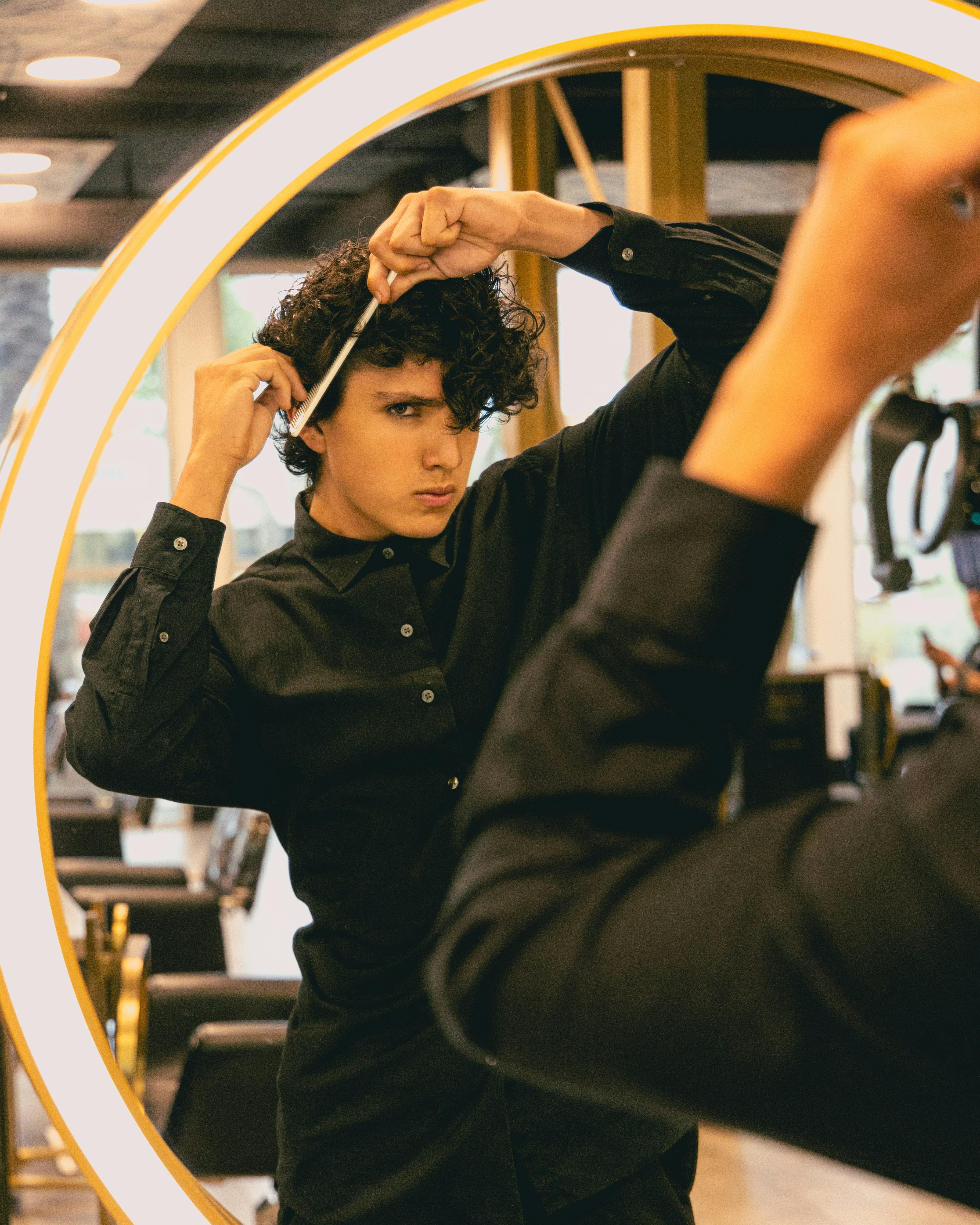 Free stock photo of adult man, adult model, combing hair Stock Photo