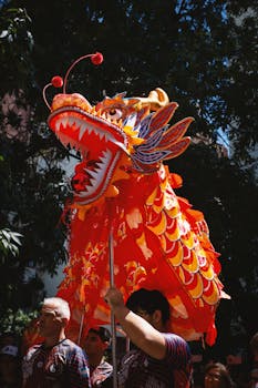 Colorful Chinese dragon dance performance during a festival in Buenos Aires.