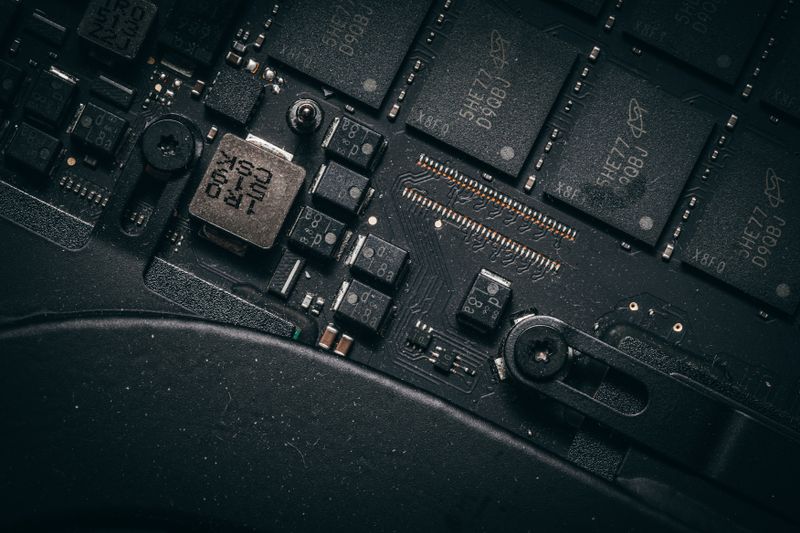NAND flash memory chips on a dense PCB, illustrating the memory silicon CXMT produces at scale