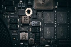 Detailed close-up of a computer circuit board highlighting electronic components and intricate design.