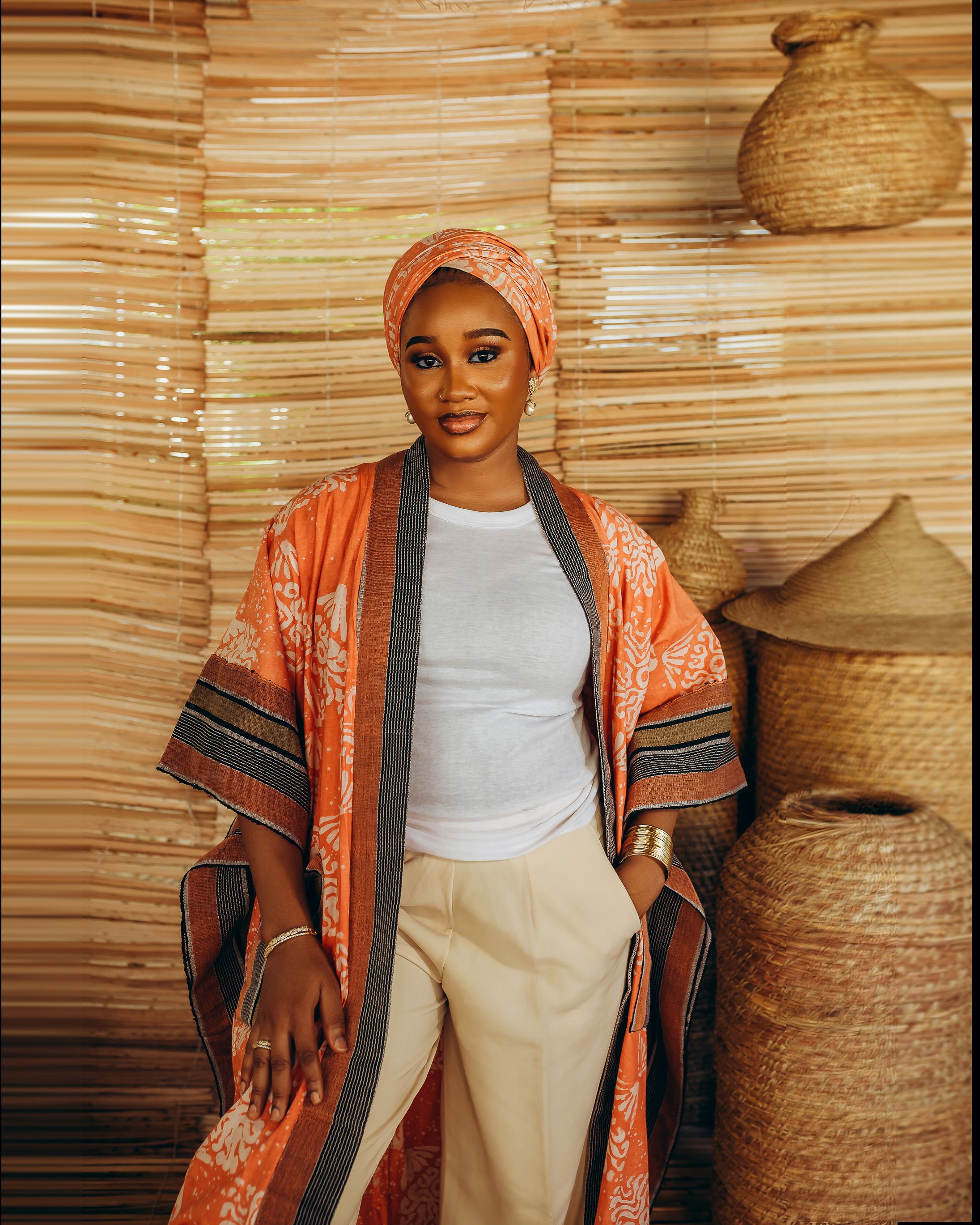 Elegant Woman in Traditional African Attire Indoors · Free Stock Photo