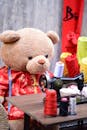 Teddy Bear Sewing in Traditional Outfit
