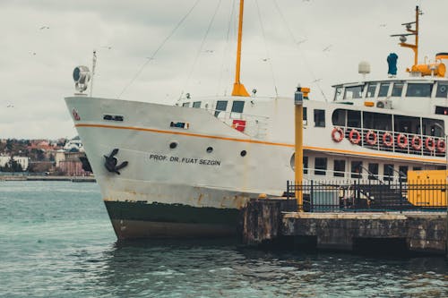 Free White and Brown Ship on Sea Stock Photo