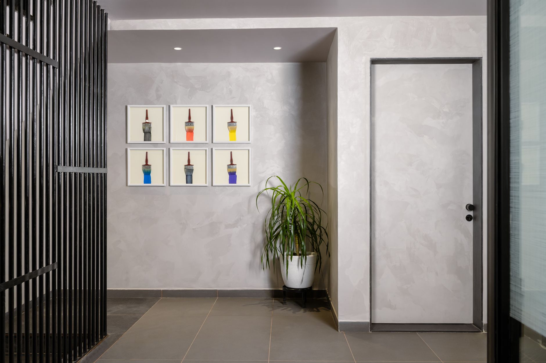 A minimalist luxury art auction gallery showcasing rare masterpieces under soft, focused architectural lighting.