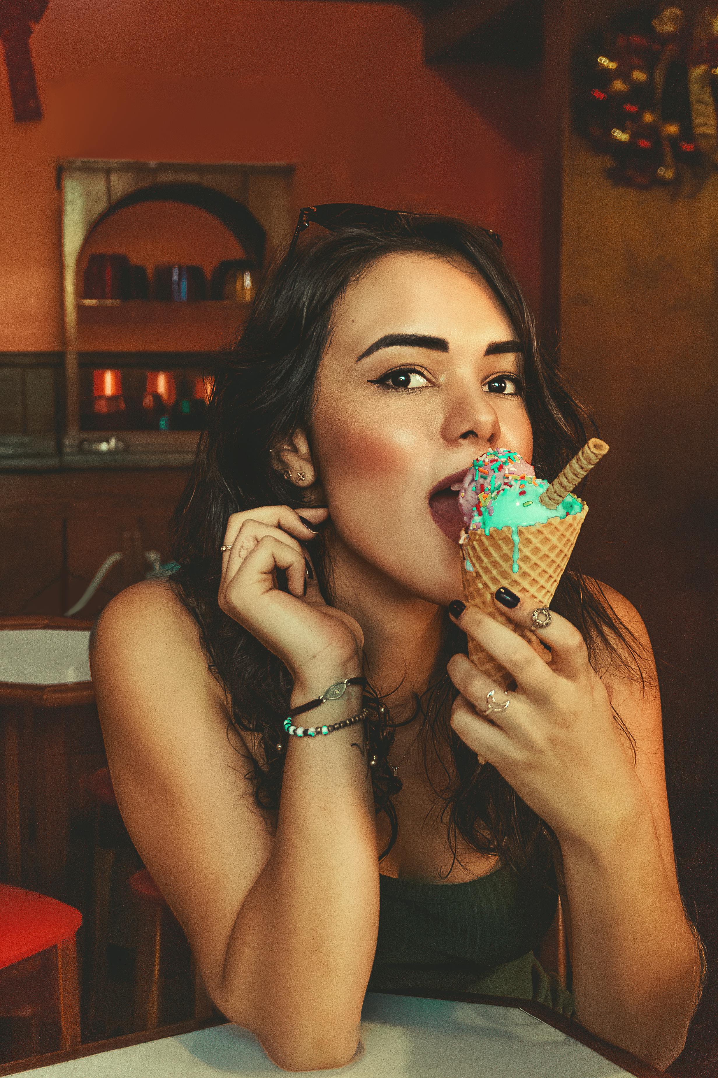 Photo Of Woman Eating Ice Cream · Free Stock Photo