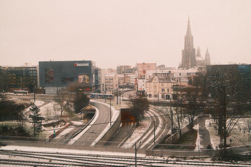Free Snowy urban landscape of Ulm featuring Ulm Minster in winter. Stock Photo
