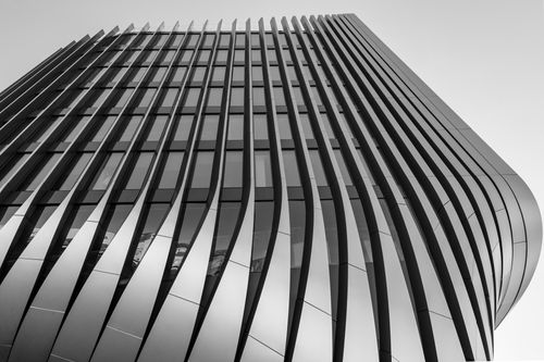 Free Modern architectural design of a futuristic high-rise building with sleek lines in Prague. Stock Photo