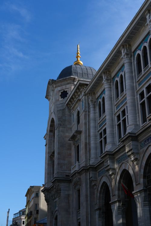 Free A detailed view of ornate historic architecture in Istanbul against a clear blue sky. Stock Photo