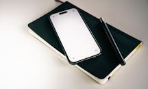 Modern Flat Lay with Smartphone and Notebook