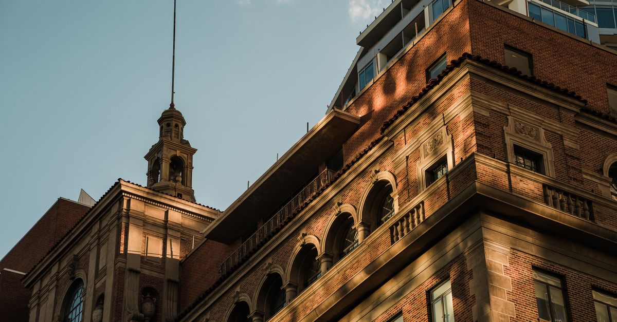 Elegant architectural detail of a historic building in Phoenix, Arizona, with warm sunset lighting.